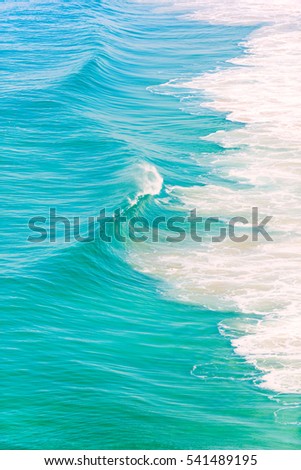 Similar – Aerial Panoramic Drone View Of Blue Ocean Waves Crushing On Sandy Beach in Portugal