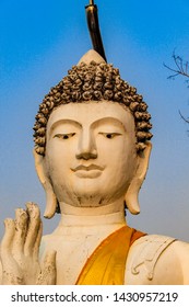 Amazing White Buddha Statue With A Gold Sash In North Thailand, Chiang Rai Provence