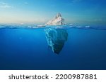 Amazing white iceberg floats in the ocean with a view underwater. Hidden Danger and Global Warming Concept. Tip of the iceberg. Half underwater. Greenland