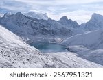 Amazing winter scenery of Himalaya panorama from route to Renjo La Pass. Gokyo settlement by lake and Mount Everest on horizon. Sagarmatha National Park, Himalayas, Nepal