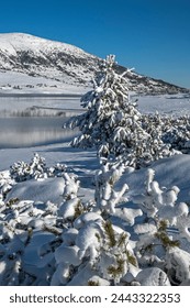 Amazing winter view of Belmeken Dam at Rila mountain, Bulgaria