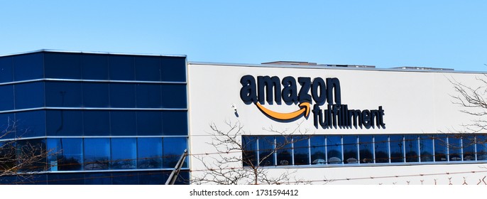 Amazon Fulfillment Center With Green Grass And Cloudy Sky In Mississauga, Ontario, Canad, May 1, 2020.