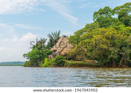Amazon rainforest lodge by Zancudococha lagoon, Cuyabeno wildlife reserve, Ecuador.