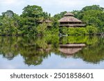 Amazon rainforest lodge reflection, Yasuni national park, Ecuador.