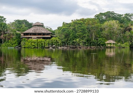 Amazon river rainforest lodge reflection, Yasuni national park, Ecuador.