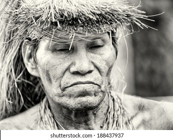 AMAZONIA, PERU - NOV 10, 2010: Unidentified Amazonian Indigenous Man Portrait. Indigenous People Of Amazonia Are Protected By  COICA (Coordinator Of Indigenous Organizations Of The Amazon River Basin)