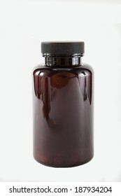 A amber bottle against a white background