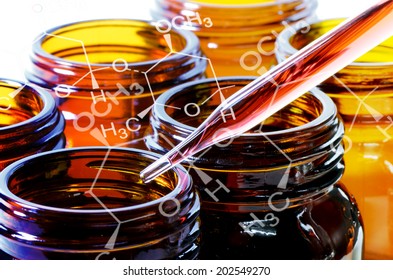 Amber Bottle And Dropper In Laboratory Testing For New Drug Or New Substance Development.