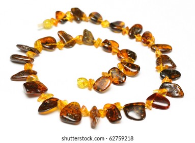 Amber Necklace Isolated On White