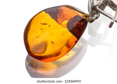 Amber pendant isolated on white background