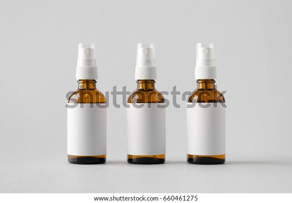 Download Amber Spray Bottle Mockup Three Bottles Stock Photo Edit Now 660461275