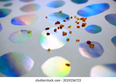 Amber Stones On An Abstract Background. Rainbow Circles, Pearlescent Spots On White Background. 