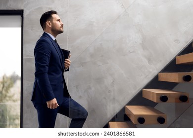 Ambition businessman walk up stairs