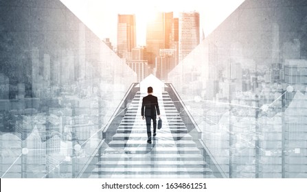 Ambitious business man climbing stairs to meet incoming challenge   business opportunity  The high stair represents the concept career path success  future planning   business competitions 