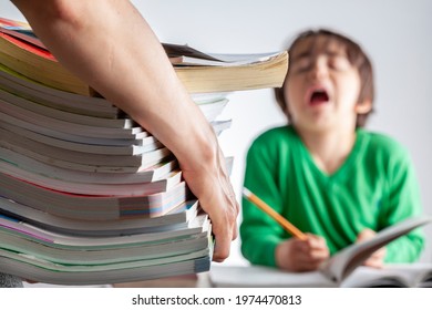 Ambitious Parenting With High Academic Achievement Expectations From Kids Concept. A Mother Is Bringing A Pile Of Test Prep Books To Her Bored, Tired Kid Who Is Crying And Protesting During Homework