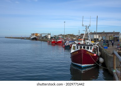 Amble, Northumberland, England, United Kingdom - 23 August 2021: Fishing Boats In The Fishing Port Of Amble In Northumbria On A Sunny Day 