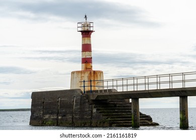 Amble, Northumberland, UK - May 22nd, 2022: The Lighthouse At The End Of The Pier.
