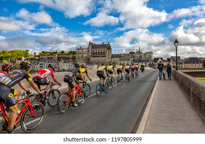 Amboise,France - October 8,2017: The Peloton Passing On The Bridge In Front Of Amboise Castle During The Paris-Tours Road Cycling Race.