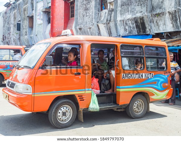 Ambon,
Indonesia - February 2018: Angkot, Public transport vehicles in
urban traffic that is colorful buses on Ambon island. Each color
goes to a different part of the island.
Asia.