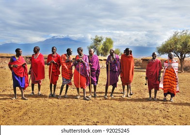 AMBOSELI, KENYA - OCT 13: Group Of Unidentified African Men From Masai Tribe Prepare To Show A Traditional Jump Dance On Oct 13, 2011 In Masai Mara, Kenya. They Are Nomadic And Live In Small Villages.