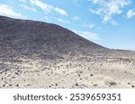 Amboy Crater in southern California is an ancient volcano which measures out to 1,500 ft in diameter. It