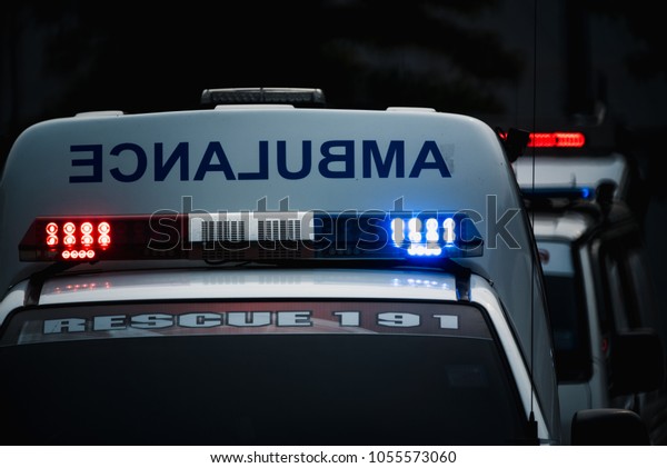 Ambulance car with siren\
light.\

