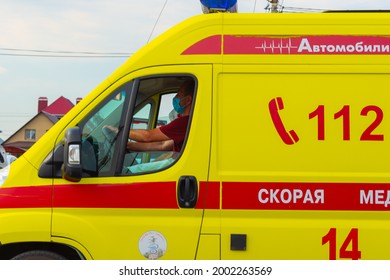 Ambulance. A Driver In A Medical Mask Is Driving. Russia, Sterlitamak. 28.06.2021