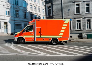 Ambulance Driving Fast Down A Road