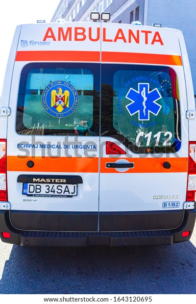 Ambulance at the entrance of\
an emergency room. Ambulance on duty. Targoviste, Romania,\
2019.