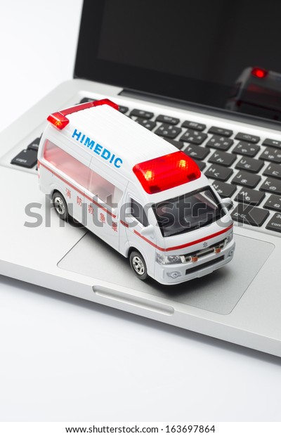 Ambulance miniature car and\
notebook pc