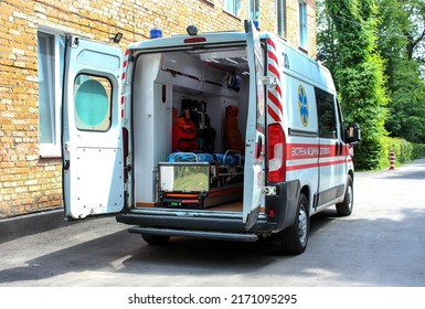 Ambulance with open doors. Emergency equipment and devices, ambulance interior details with necessary patient care equipment. Basic equipment for emergency inside ambulance.