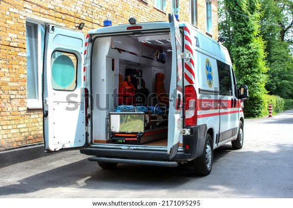 Ambulance with\
open doors. Emergency equipment and devices, ambulance interior\
details with necessary patient care equipment. Basic equipment for\
emergency inside\
ambulance.