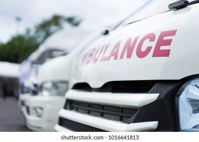 Ambulance With Patient Care In The Hospital At Moning.