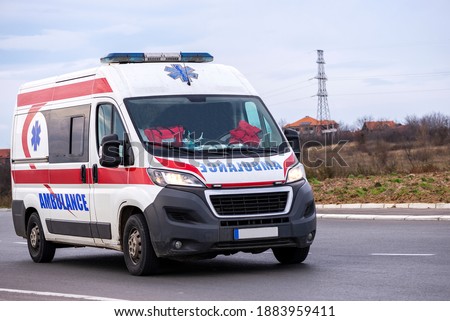 Ambulance. Special medical vehicles. Ambulance van on road. Ambulance service van on street.