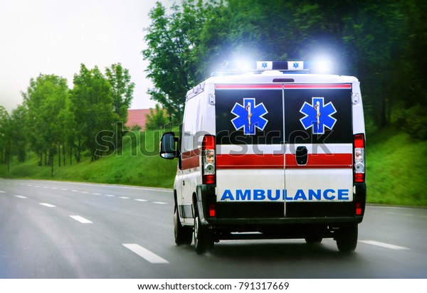 Ambulance van on\
highway