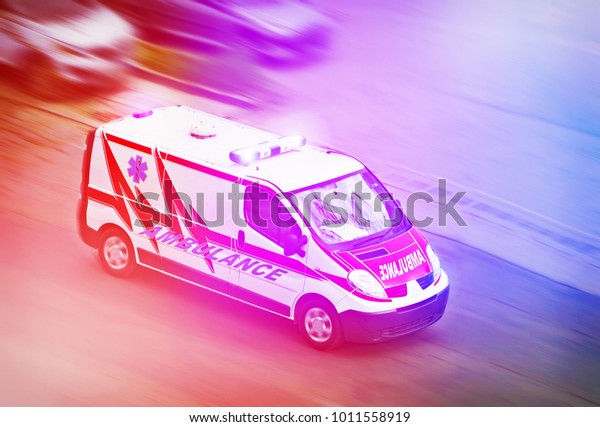 Ambulance van on highway,\
emergency