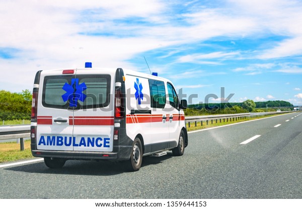 Ambulance van on\
road