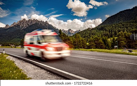 Ambulance van rushes down the highway - Powered by Shutterstock