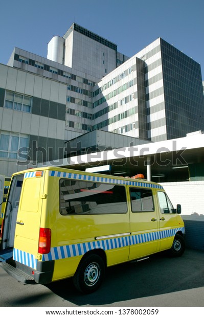 Ambulance vehicles on an hospital parking.\
Emergency transport.\
Medicine
