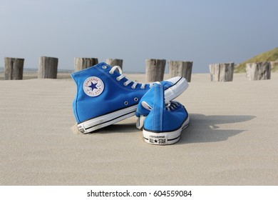Converse Shoes On the Beach Stock 