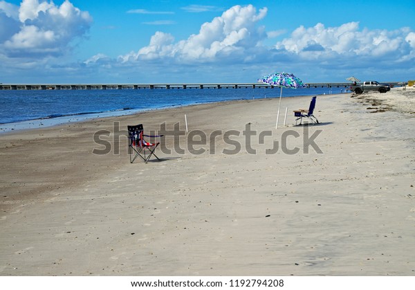 AMELIA ISLAND, FLORIDA, US - OCTOBER 22th, 2017:\
Beach-life on the Fernandina Beach on Amelia island on October 22,\
2017. People often come by car to the beaches to take sunbathe and\
swim in the ocean