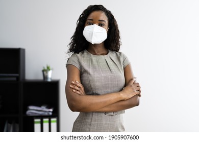 American African Woman At Office Reception In FFP2 Face Mask