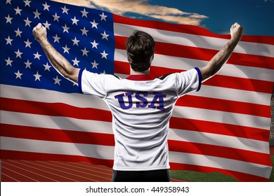 American Athlete Winning a golden medal in front of a american flag.