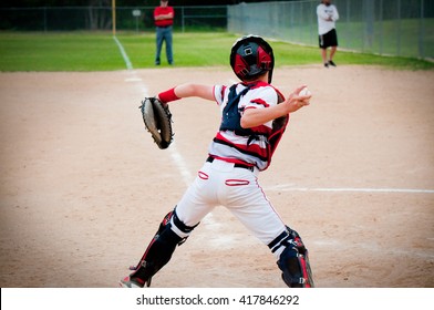 American Baseball Catcher Throwing Ball.