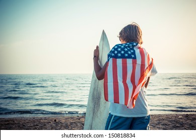 American Boy with Surf Board - Powered by Shutterstock