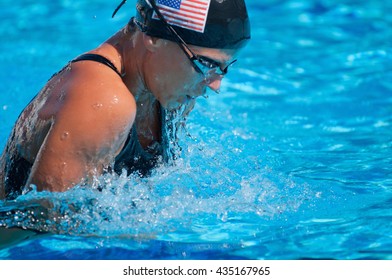 American breast stroke swimmer taking breath