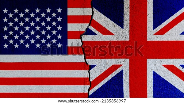 American and
British flags on broken cracked
wall.