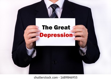 American Businessman Holds A Card With The Text The Great Depression. Business Concept