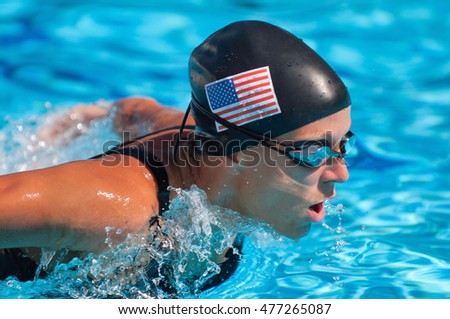 American butterfly style swimmer close-up