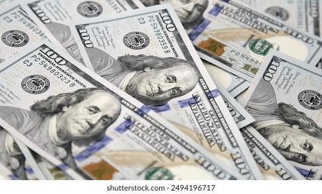 American cash dollars close up. A large amount of cash American dollars in cash paper bills. Finance concept